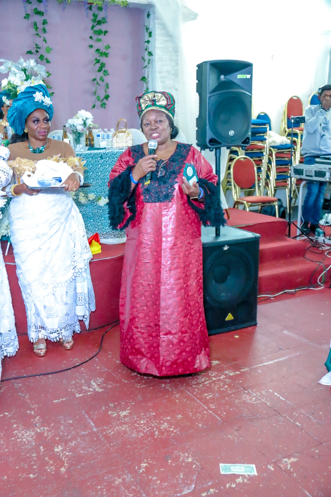 An NWAMS leader speaking to women at a community event