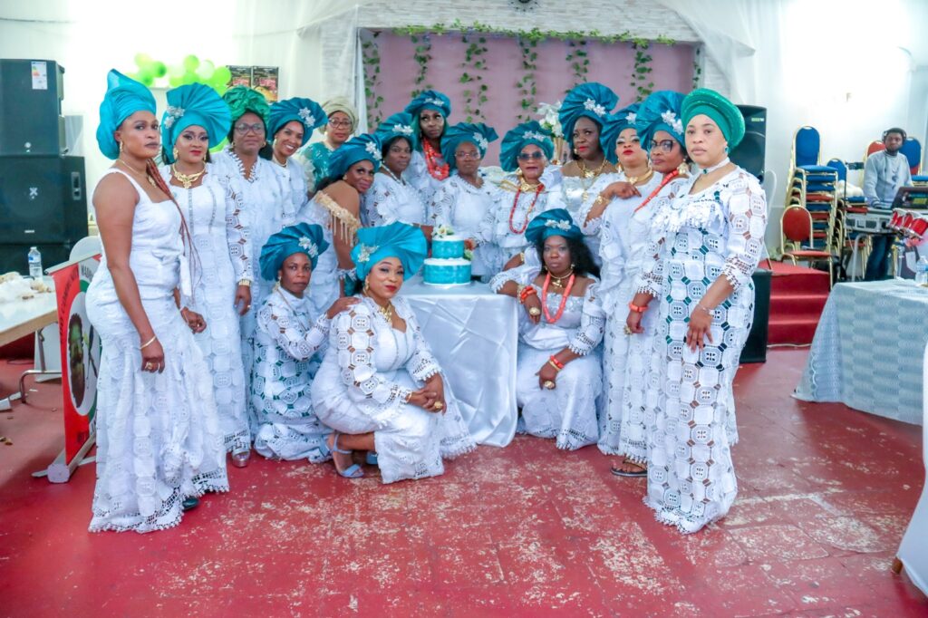 NWAMS members standing together at a community celebration